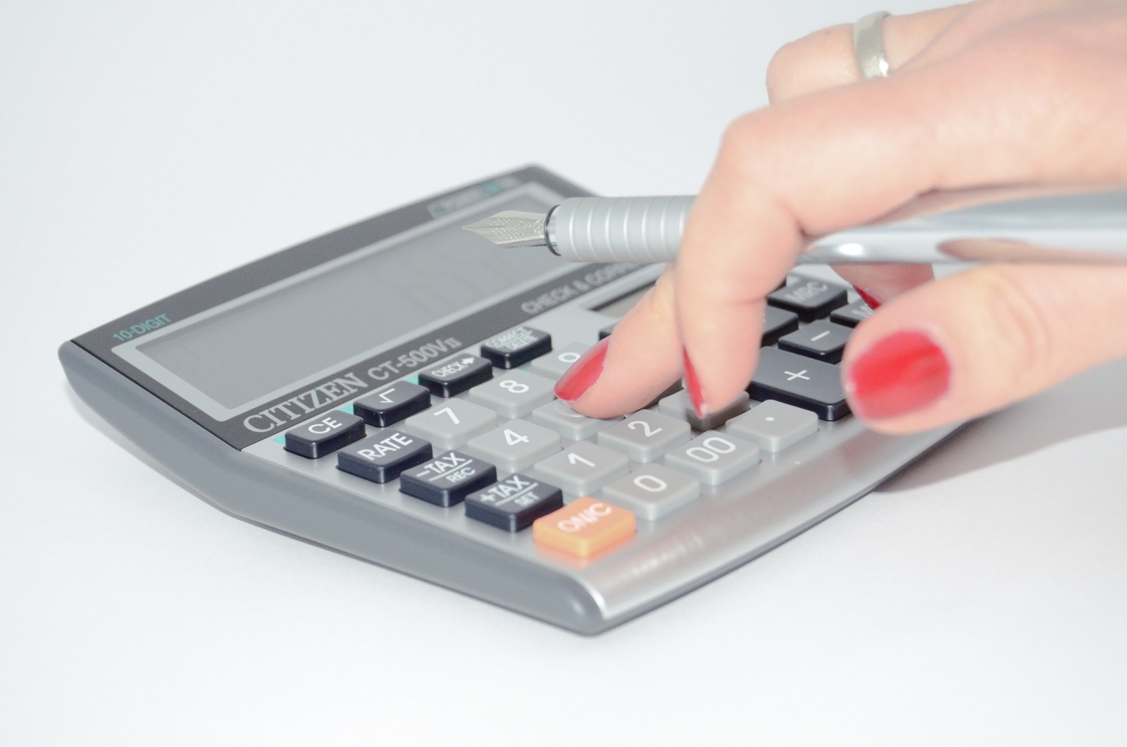 calculator-the-hand-calculate-count-add-taxes - The PA Notary