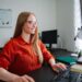 Professional woman engaged in remote work at a modern desk setup